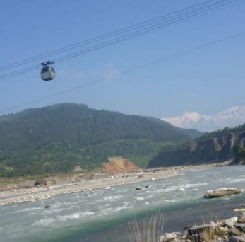It is a bicable bidirectional type of ropeway technology operates under motor power design and builds by the engineers of Nepal using locally available materials. The system is installed as prototype for human transportation connecting Kotre, Tanahun and Punditar, Kaski over Seti River having 520m with 25m level difference. At that section, numerous efforts of bridge construction was in vain due to technical infeasibility. So ropeway technology for river crossing is the best at such long span. The technology is also economical considering construction as well as operation cost for the span greater than 450 meters